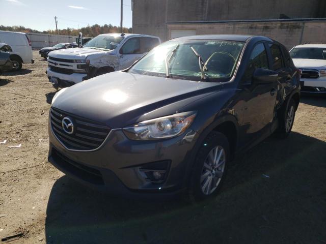 Photo 2 from auction – 2015 MAZDA CX-5 with VIN JM3KE4CYXG0607804