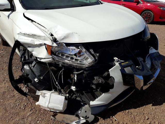 Photo 9 from auction – 2015 NISSAN ROGUE S with VIN 5N1AT2MT2FC763104