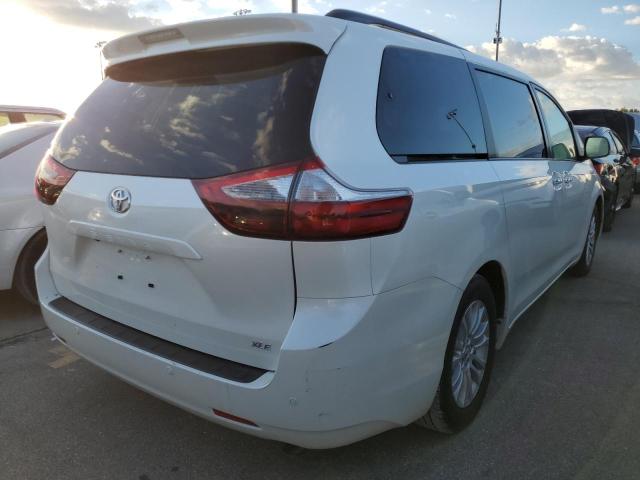 Photo 4 from auction – 2015 TOYOTA SIENNA XLE with VIN 5TDYK3DC7FS650579
