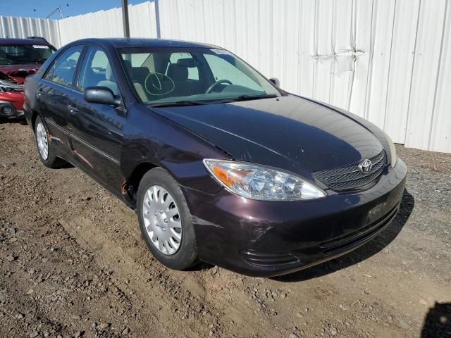 TOYOTA CAMRY LE 2002 with VIN 4T1BE30K12U598958 - Photo from auction