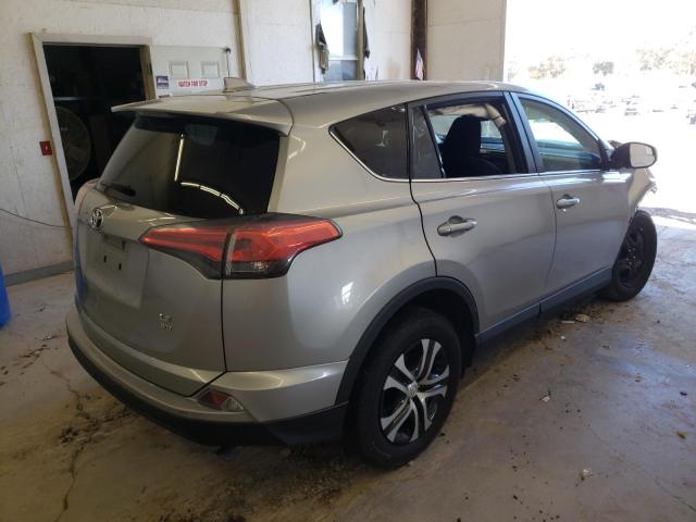 Photo 4 from auction – 2018 TOYOTA RAV4 LE with VIN 2T3BFREV1JW751587