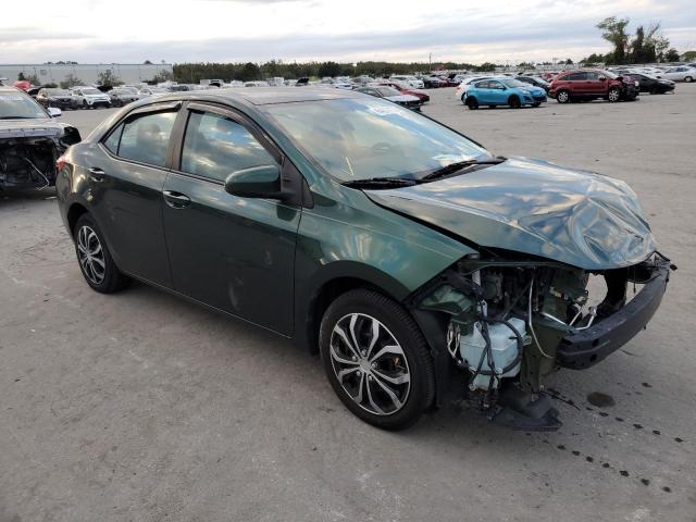 TOYOTA COROLLA L 2014 with VIN 5YFBURHE5EP121024 - Photo from auction