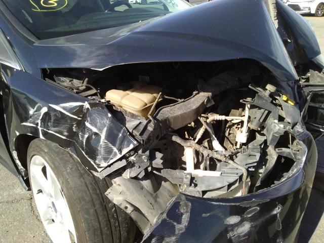 Photo 10 from auction – 2014 FORD FOCUS TITA with VIN 1FADP3J23EL254635