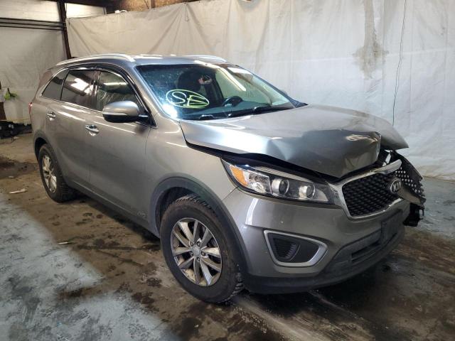 KIA SORENTO LX 2016 with VIN 5XYPGDA32GG090332 - Photo from auction