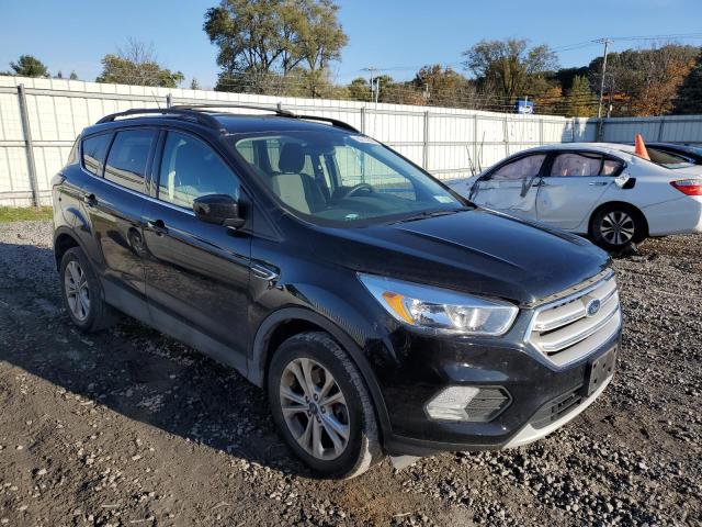 FORD ESCAPE SE 2018 with VIN 1FMCU9GD1JUC66342 - Photo from auction