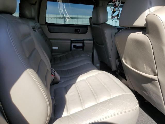 Фото 6 с аукциона – 2003 HUMMER H2 с VIN 5GRGN23U23H103628