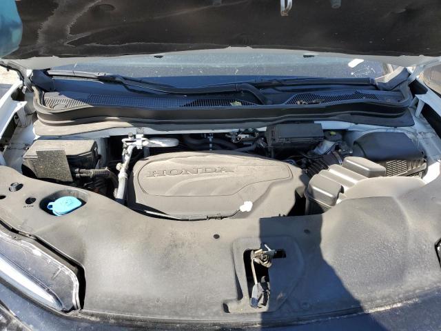 Photo 7 from auction – 2021 HONDA PASSPORT E with VIN 5FNYF8H56MB011561