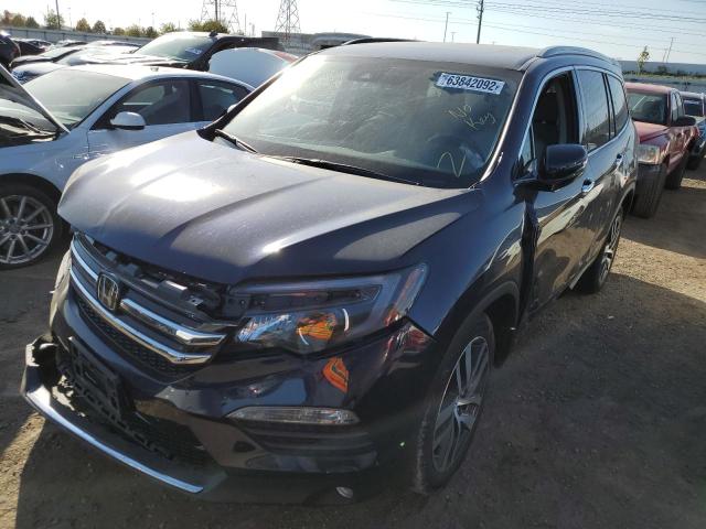 Photo 2 from auction – 2017 HONDA PILOT TOUR with VIN 5FNYF6H97HB032030