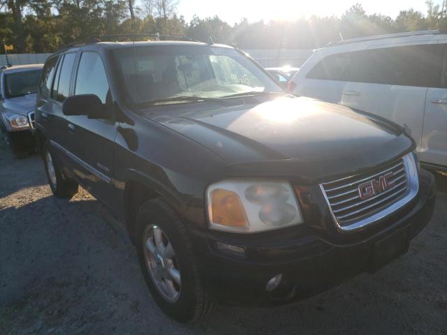 GMC ENVOY 2006 with VIN 1GKDS13S662144619 - Photo from auction