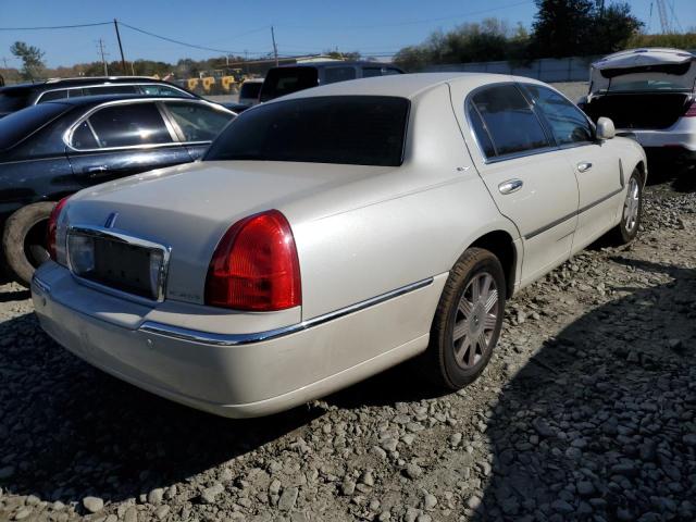Photo 4 from auction – 2004 LINCOLN TOWN CAR U with VIN 1LNHM83W44Y672619