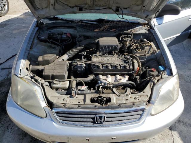 Photo 7 from auction – 2000 HONDA CIVIC BASE with VIN 2HGEJ6619YH566074