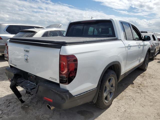 Photo 4 from auction – 2021 HONDA RIDGELINE with VIN 5FPYK3F78MB005044