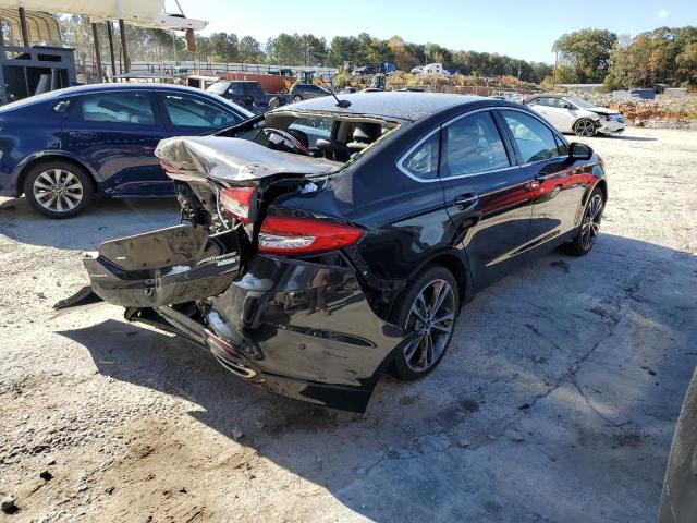 Photo 4 from auction – 2017 FORD FUSION TIT with VIN 3FA6P0K90HR289416