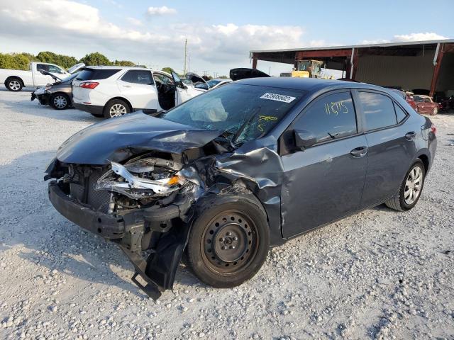 Photo 2 from auction – 2014 TOYOTA COROLLA L with VIN 2T1BURHEXEC095083