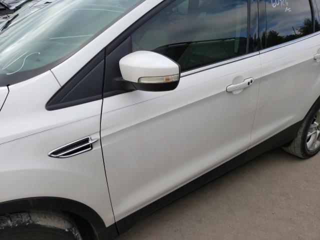 Photo 9 from auction – 2015 FORD ESCAPE TIT with VIN 1FMCU0J94FUC10807