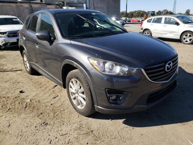 MAZDA CX-5 2015 with VIN JM3KE4CYXG0607804 - Photo from auction