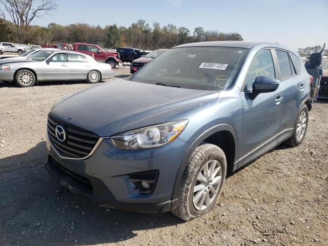 Photo 2 from auction – 2016 MAZDA CX-5 TOURI with VIN JM3KE4CY5G0644047