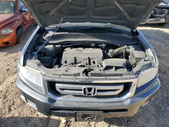 Photo 7 from auction – 2010 HONDA RIDGELINE with VIN 5FPYK1F50AB012794