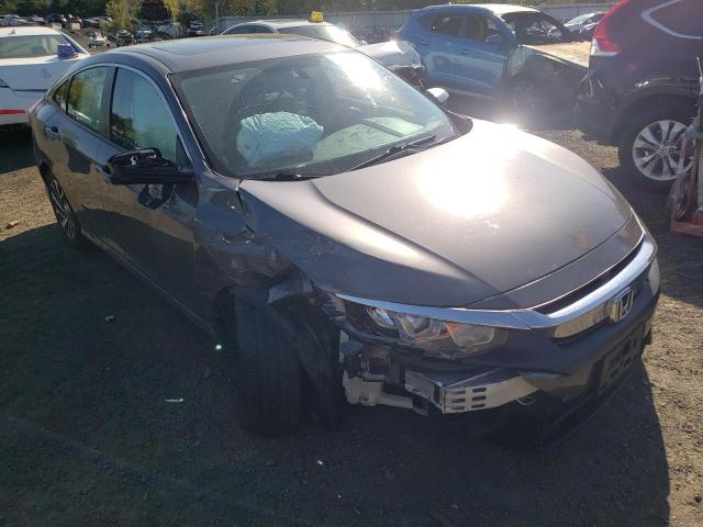 HONDA CIVIC EX 2018 with VIN 2HGFC2F70JH502880 - Photo from auction