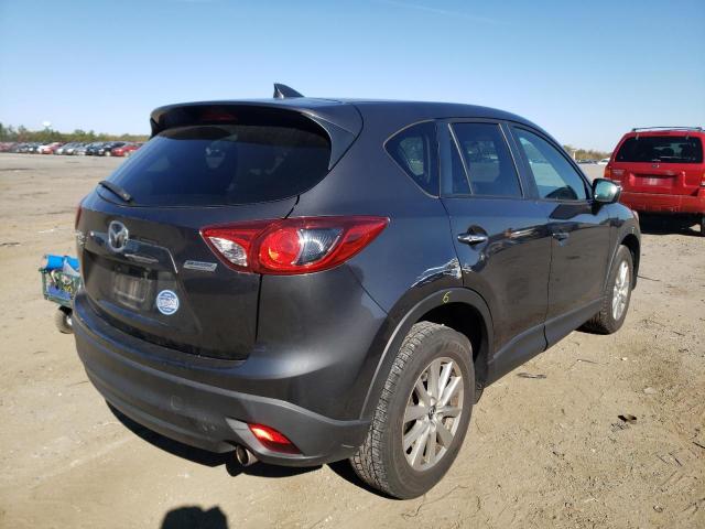 Photo 4 from auction – 2015 MAZDA CX-5 with VIN JM3KE4CYXG0607804