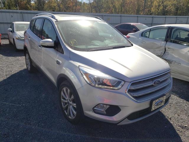 FORD ESCAPE TIT 2017 with VIN 1FMCU9J98HUD48440 - Photo from auction