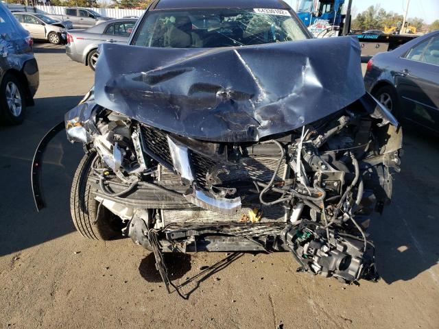 Photo 9 from auction – 2015 NISSAN ROGUE S with VIN 5N1AT2MV9FC853173