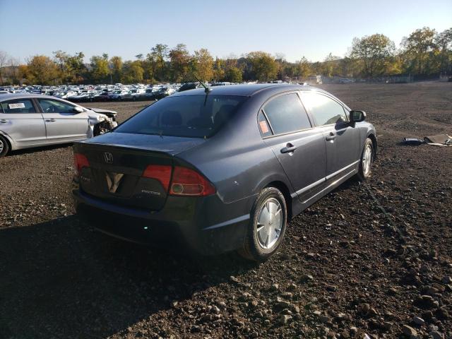 Photo 4 from auction – 2006 HONDA CIVIC HYBR with VIN JHMFA36226S009974