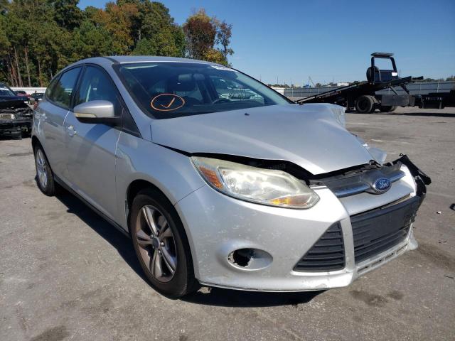FORD FOCUS SE 2014 with VIN 1FADP3K20EL103413 - Photo from auction
