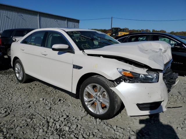 FORD TAURUS SEL 2017 with VIN 1FAHP2E89HG122132 - Photo from auction