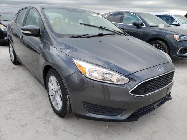 FORD FOCUS SE 2017 with VIN 1FADP3F28HL338317 - Photo from auction