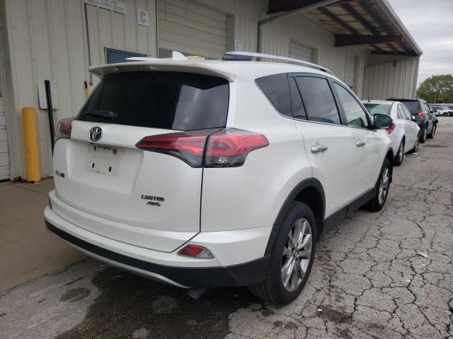 Photo 4 from auction – 2016 TOYOTA RAV4 LIMIT with VIN JTMDFREV1GJ055263