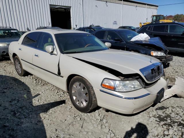 LINCOLN TOWN CAR U 2004 with VIN 1LNHM83W44Y672619 - Photo from auction