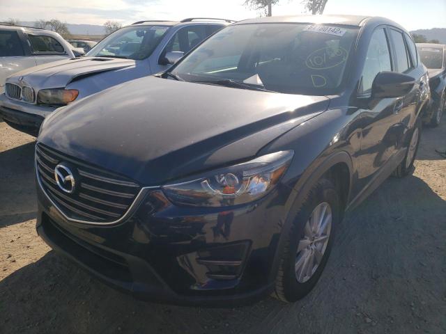 Photo 2 from auction – 2016 MAZDA CX-5 TOURI with VIN JM3KE2CY6G0657734