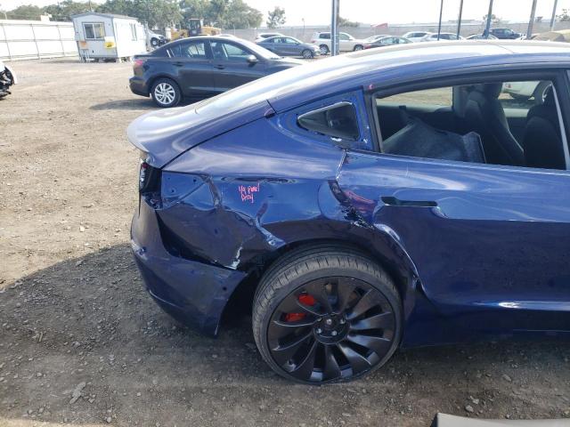 Photo 9 from auction – 2022 TESLA MODEL 3 with VIN 5YJ3E1EC9NF275933