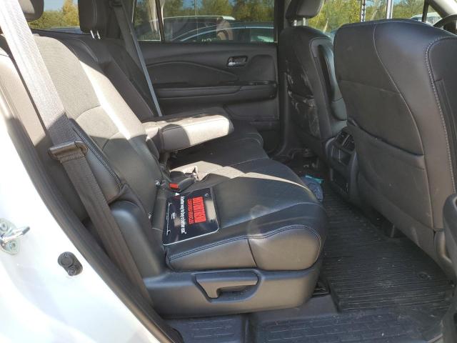 Photo 6 from auction – 2021 HONDA PASSPORT E with VIN 5FNYF8H56MB011561