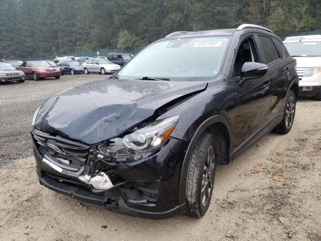 Photo 2 from auction – 2016 MAZDA CX-5 GT with VIN JM3KE4DYXG0668066
