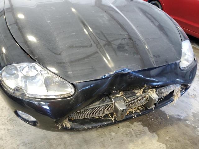 صورة رقم 9 من المزاد - 2003 JAGUAR XK8 مع VIN SAJDA42CX32A33954