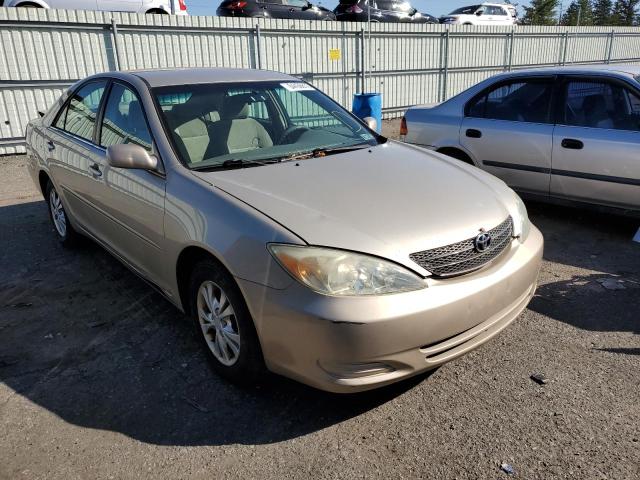 TOYOTA CAMRY LE 2004 with VIN 4T1BF30K14U078808 - Photo from auction