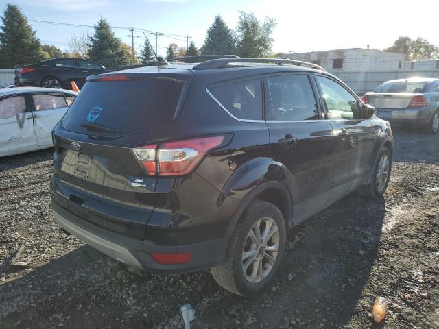 Photo 4 from auction – 2018 FORD ESCAPE SE with VIN 1FMCU9GD1JUC66342