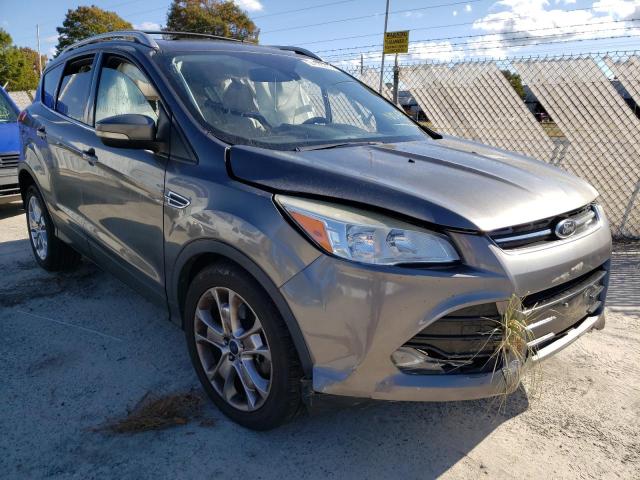 FORD ESCAPE TIT 2014 with VIN 1FMCU9J9XEUC28098 - Photo from auction