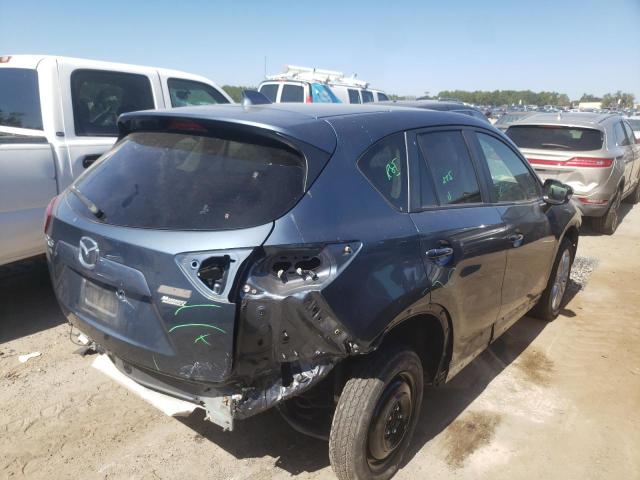 Photo 4 from auction – 2015 MAZDA CX-5 GT with VIN JM3KE2DY8F0489737