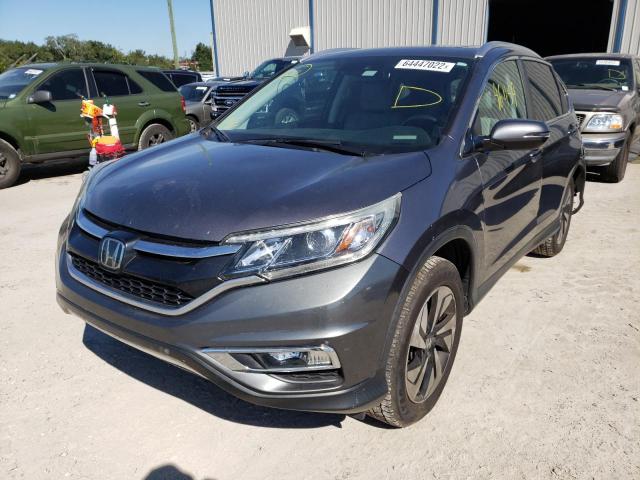 Photo 2 from auction – 2015 HONDA CR-V TOURI with VIN 5J6RM3H95FL024778