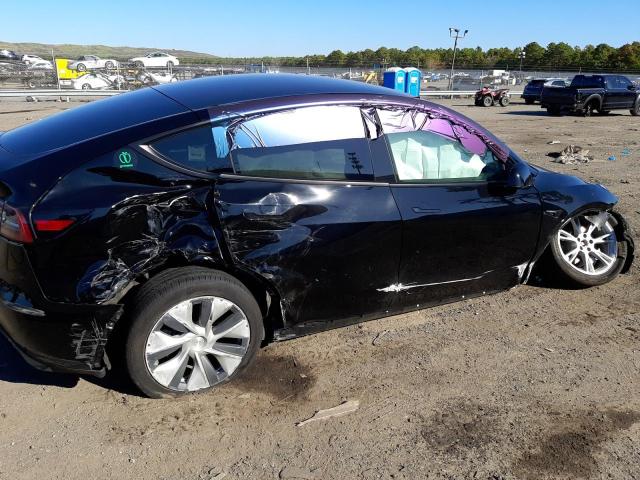 Photo 9 from auction – 2022 TESLA MODEL Y with VIN 7SAYGDEE8NF408672