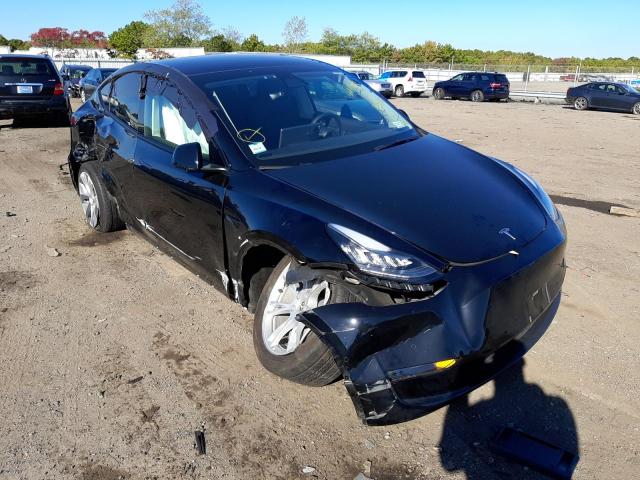 TESLA MODEL Y 2022 with VIN 7SAYGDEE8NF408672 - Photo from auction