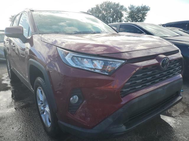 TOYOTA RAV4 XLE 2019 with VIN JTMP1RFV7KD019871 - Photo from auction