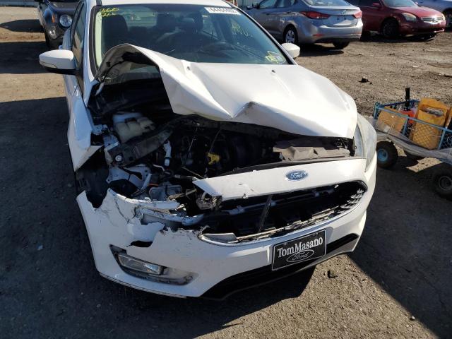Photo 9 from auction – 2016 FORD FOCUS SE with VIN 1FADP3F24GL326597