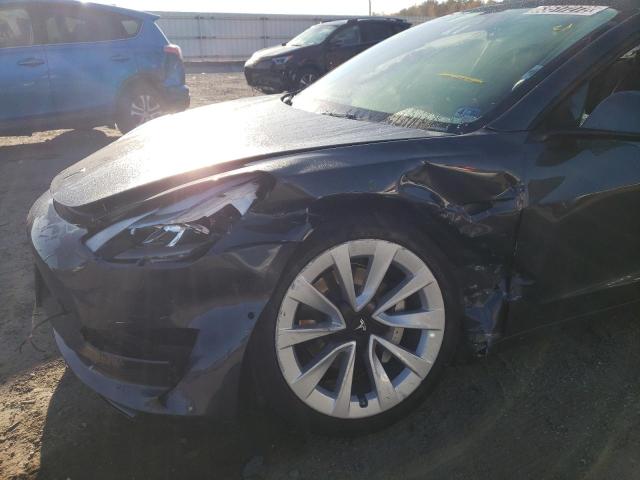 Photo 9 from auction – 2022 TESLA MODEL 3 with VIN 5YJ3E1EA7NF186389