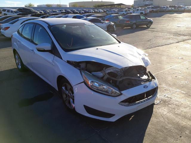 FORD FOCUS SE 2015 with VIN 1FADP3F21FL203936 - Photo from auction