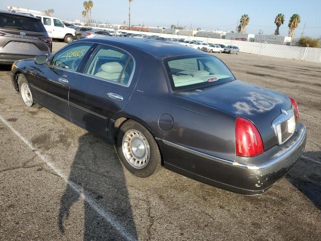 Photo 3 from auction – 1999 LINCOLN TOWN CAR E with VIN 1LNHM81W5XY708065
