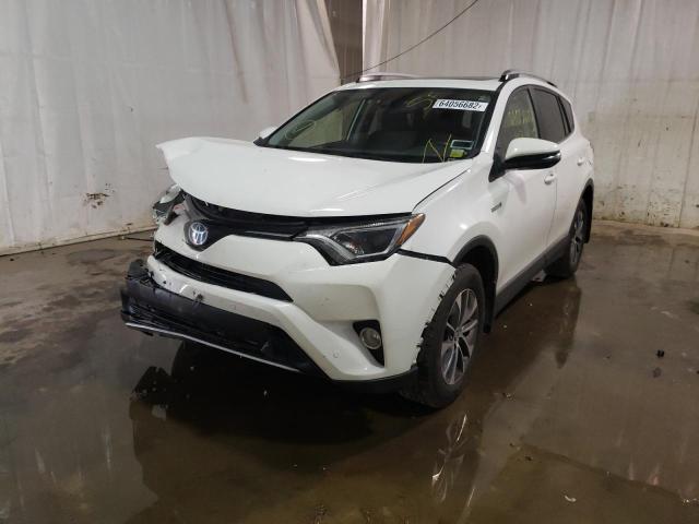 Photo 2 from auction – 2017 TOYOTA RAV4 HV LE with VIN JTMRJREV5HD098752
